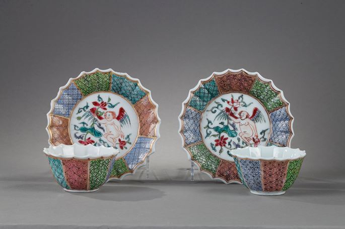 Pair cups and saucers Famille rose porcelain decorated with a putto holding a lotus flower | MasterArt
